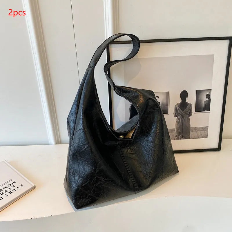 Casual soft PU leather shoulder bag in street trend style with a sandwich pocket.