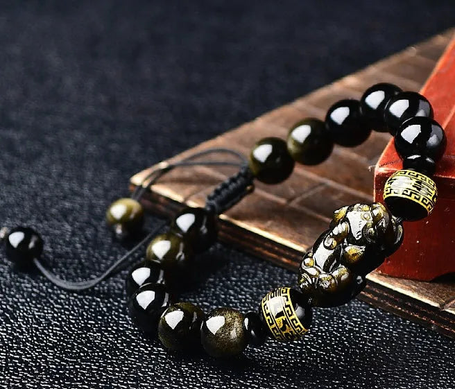Golden obsidian Pi Xiu bracelet with hand-woven beads in Chinese animal zodiac style