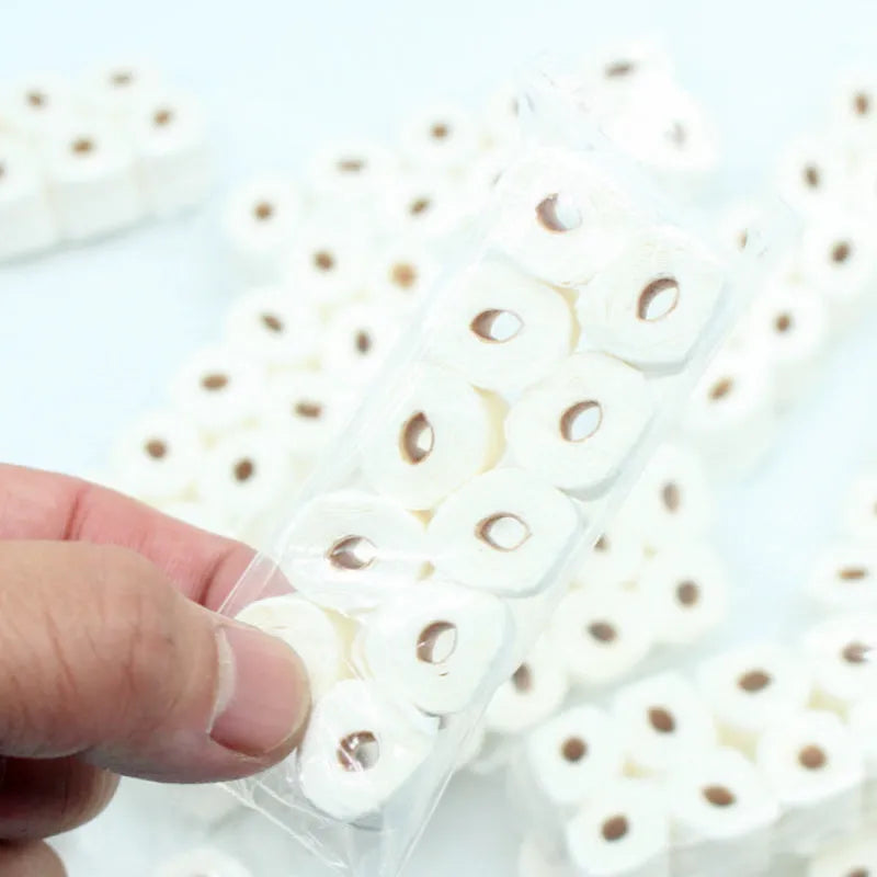 Miniature brown paper toilet paper roll model for childrens toys, size 30mm by 15mm by 80mm.