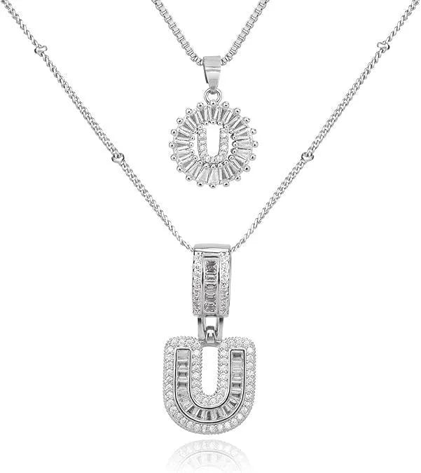 26 English letters copper-plated gold diamond initial pendant necklace with adjustable chain on display