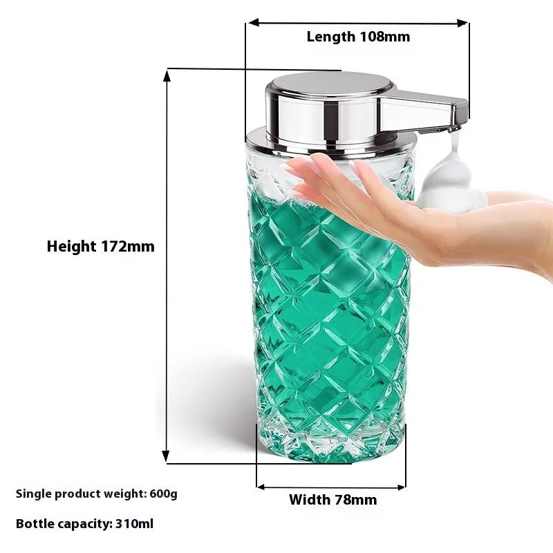 Silver automatic sensor soap dispenser with USB Type-C charging port on a bathroom counter.
