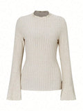 Long sleeve slim fit top with lantern sleeves in black brushed polyester fabric.