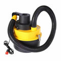 Car portable vacuum cleaner with high power 90W, red, with attachments including brush and hose on a car seat