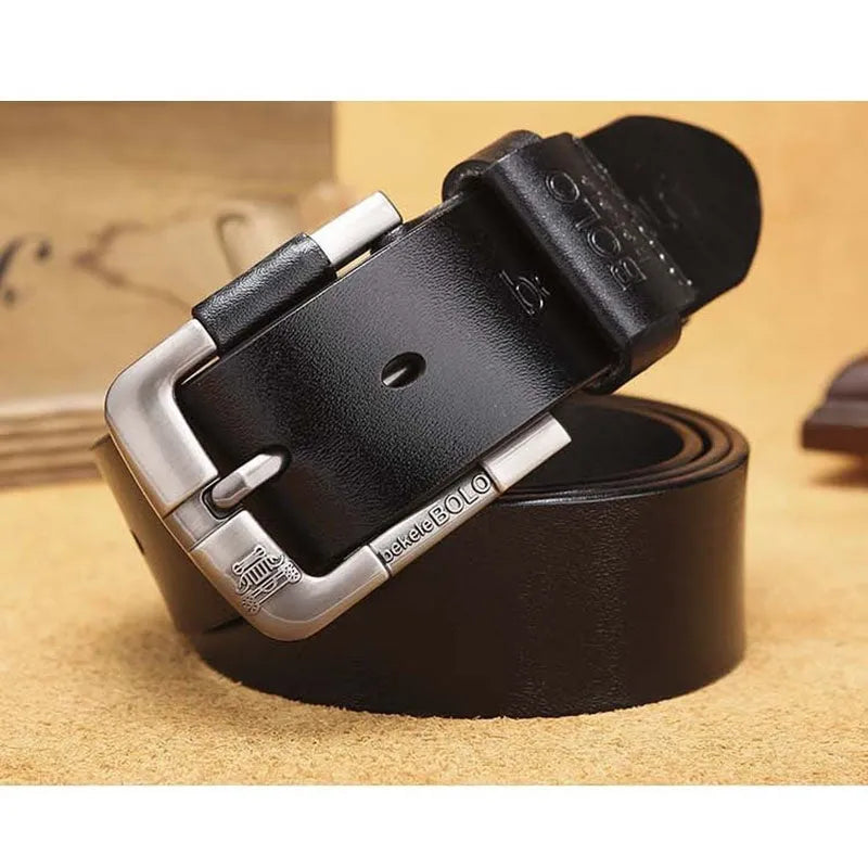 Men's cowhide leather belt with round alloy pin buckle, black colour, on a flat surface