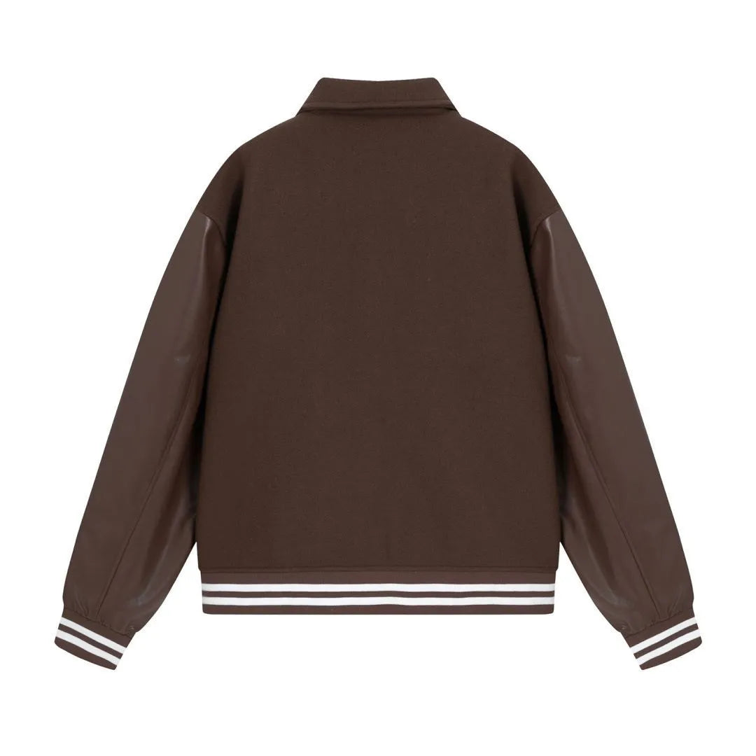 Women's apricot woollen jacket with white bone embroidery on the front.