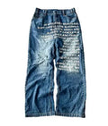Men's black and blue cotton wide-leg straight casual trousers on a hanger, showing loose fit