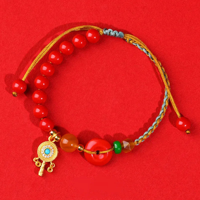 Hand-woven cinnabar peace buckle bracelet in emperor red sand colour with geometric design
