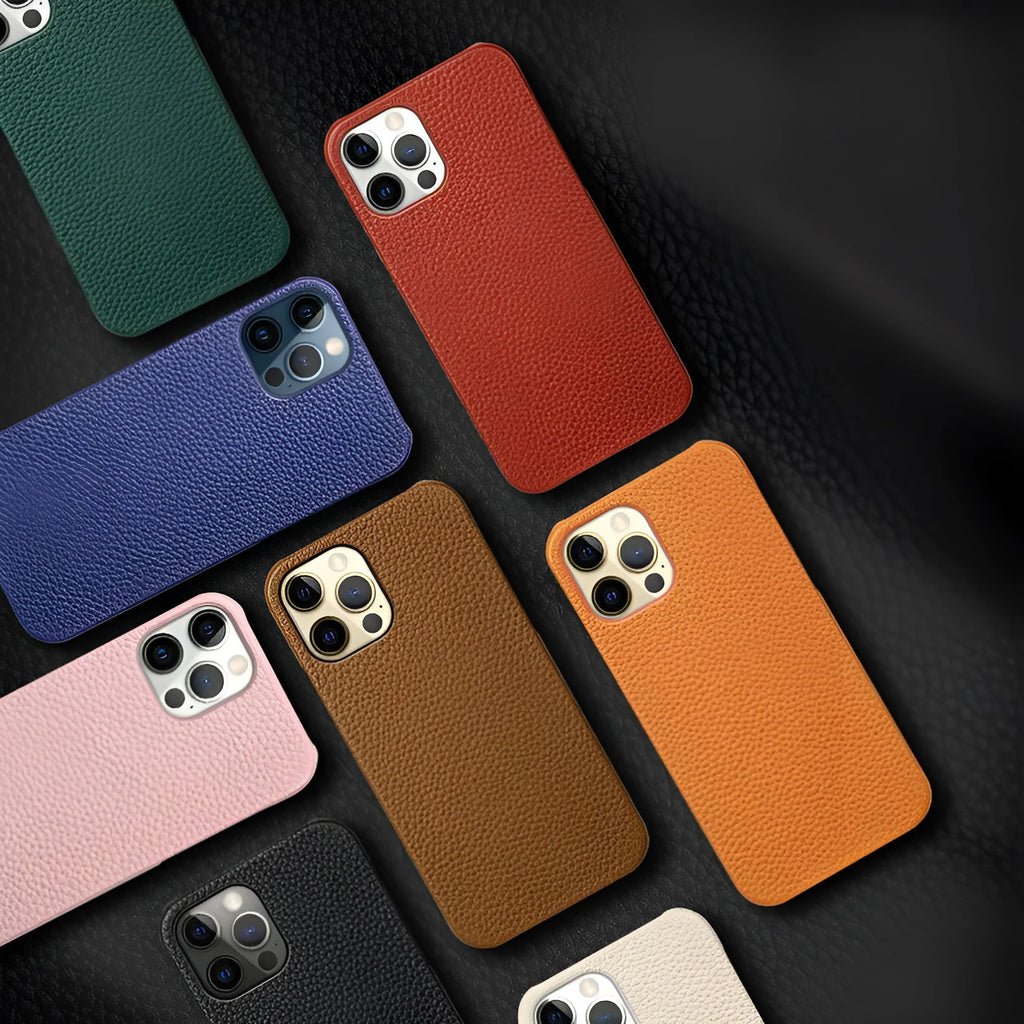 Genuine brown cowhide leather iPhone case with simple half line design on an iPhone 14 Pro Max.