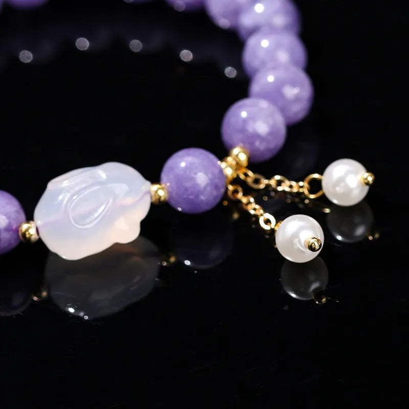 Purple geometric bracelet with aquamarine and lychee jelly agate beads in 6mm, 8mm, and 12x16mm sizes.