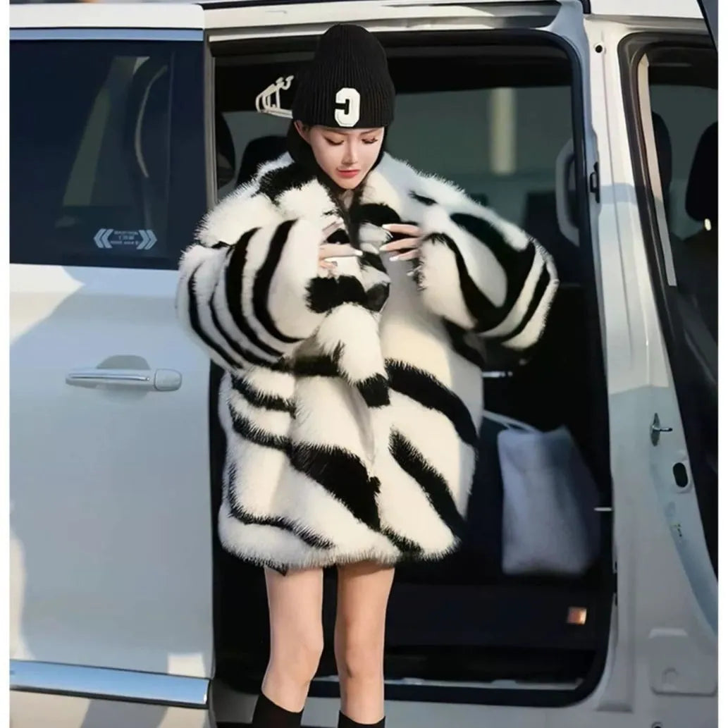 Women's zebra stripe polyester fur top with large skimmer collar and long sleeves