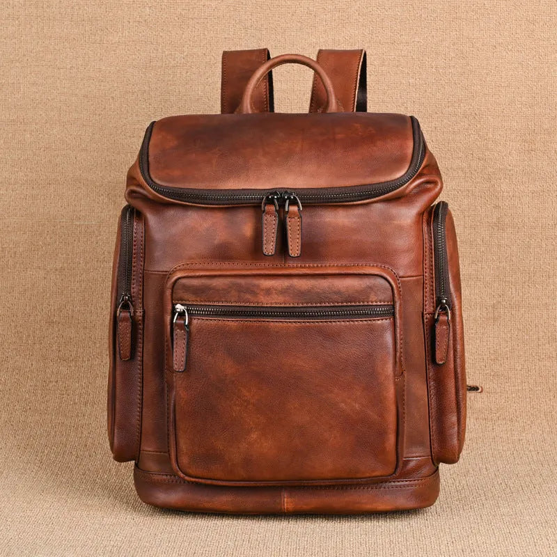 Genuine leather 14 inch men's backpack in light brown with retro patchwork and polyester cotton lining