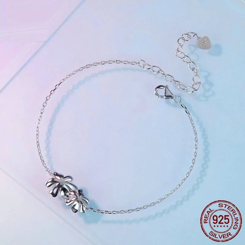 S925 silver flower bracelet with 160+50mm adjustable chain, 9x17mm floral pendant and 2.1g weight