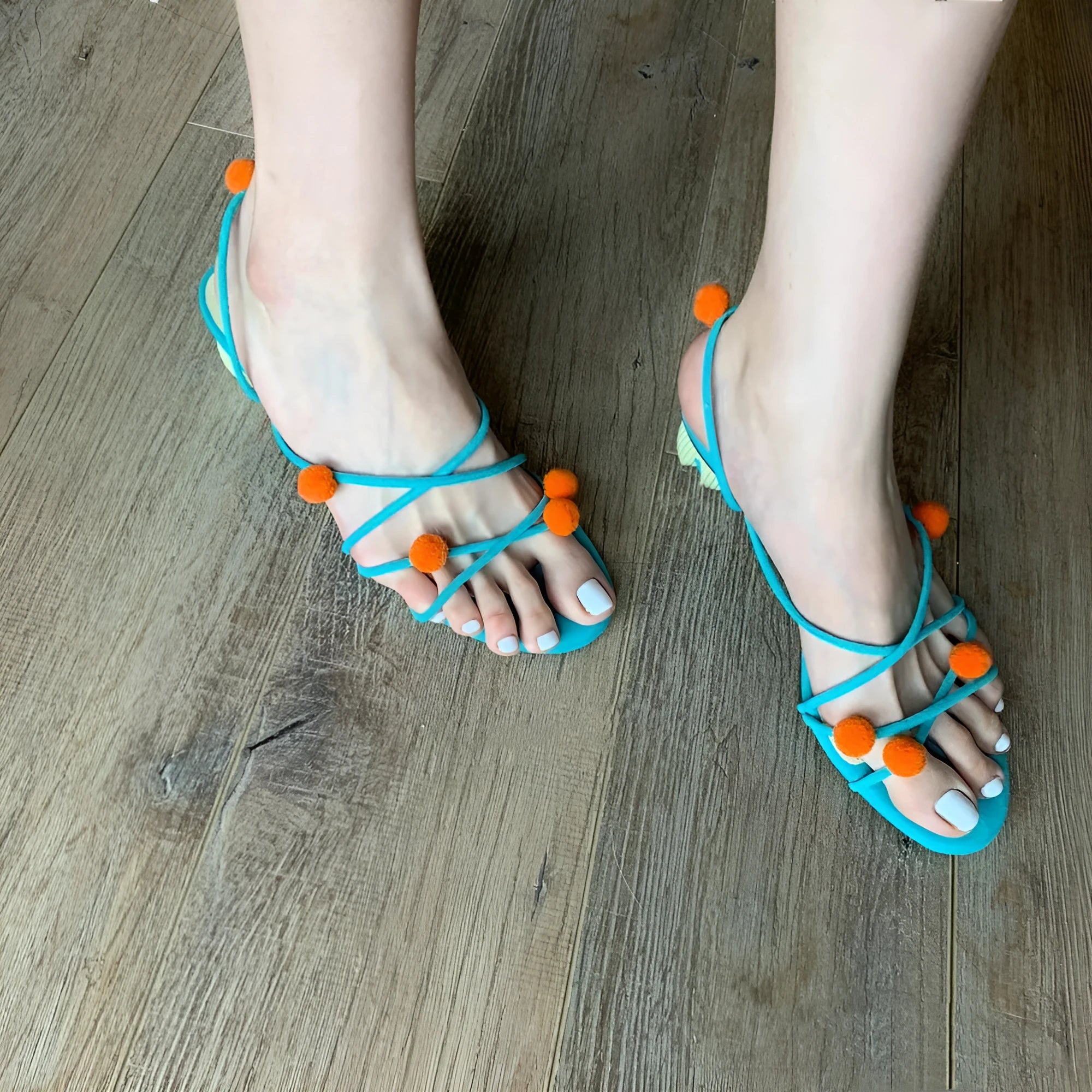 Cyan women's high-heeled sandals with lace-up straps, open toe, and thin straps made from French leather.