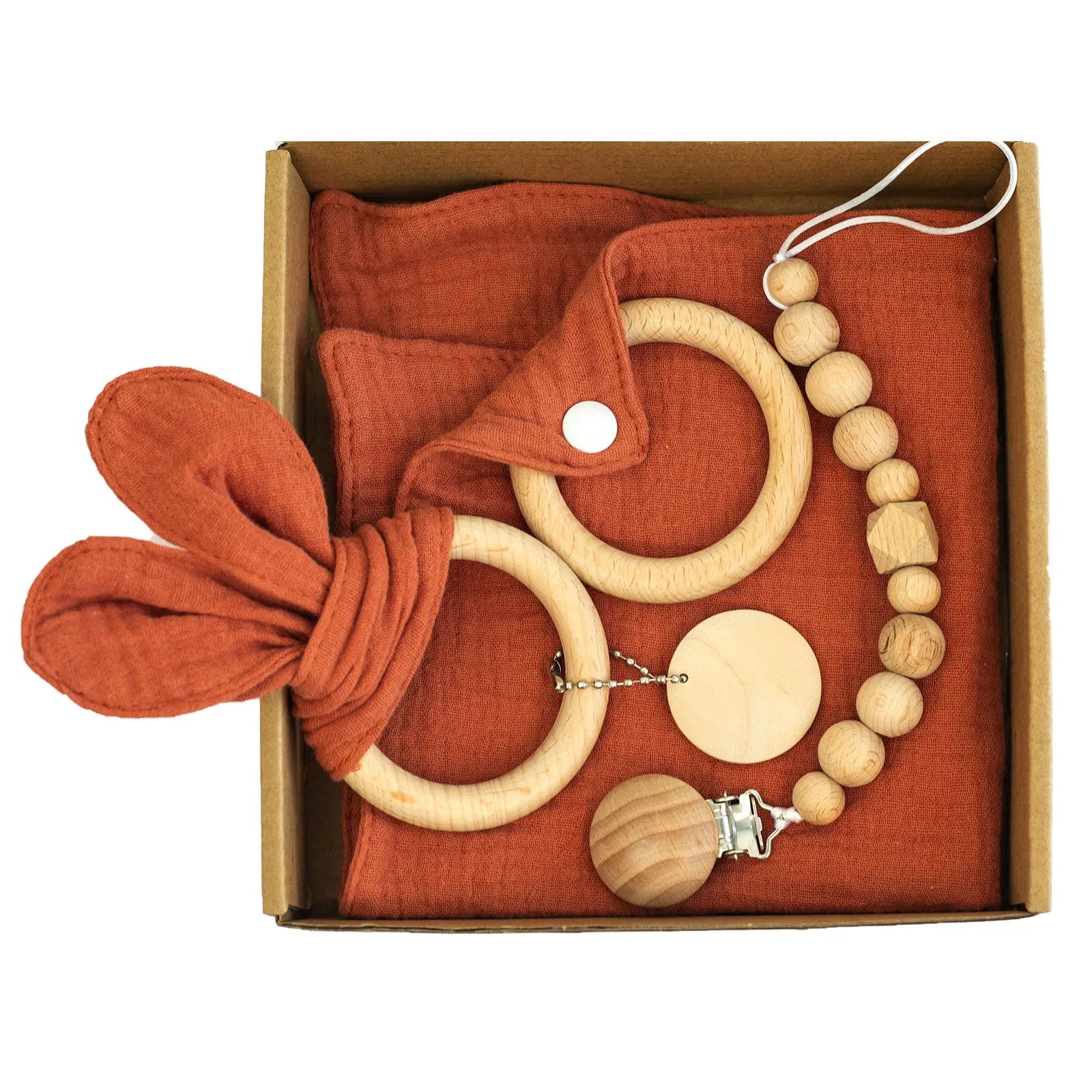 Baby teething gift set with bamboo gauze blanket, wooden chewing ring, woven bell, and developmental toys
