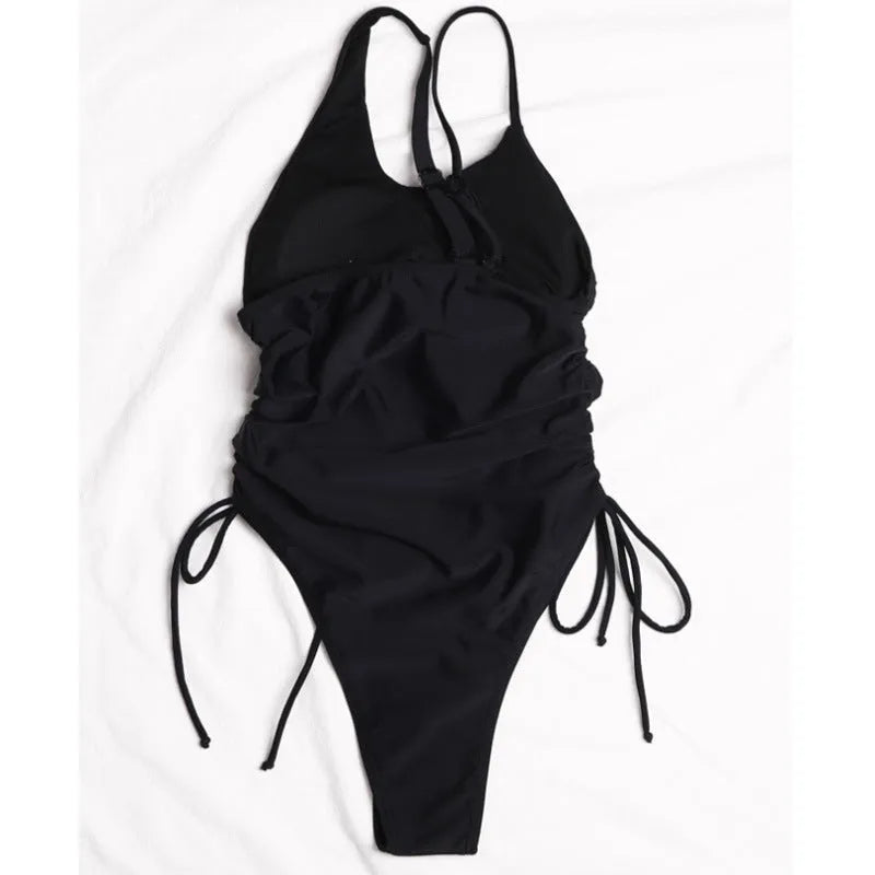 Black women's sleeveless dress with sloping shoulders and lacing detail