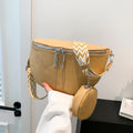 Women's solid colour PU crossbody bag with clamshell design and single shoulder strap.