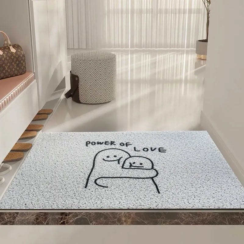 Square PVC floor mat with Mr. Big Nose cartoon face and geometric pattern, shown in available sizes.