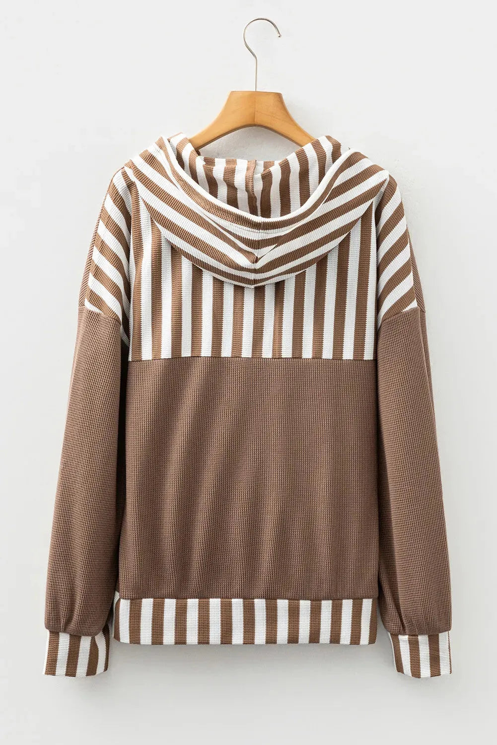 Straw yellow women's hoodie with waffle texture and striped patchwork design, featuring a button neck and drawstring waist.