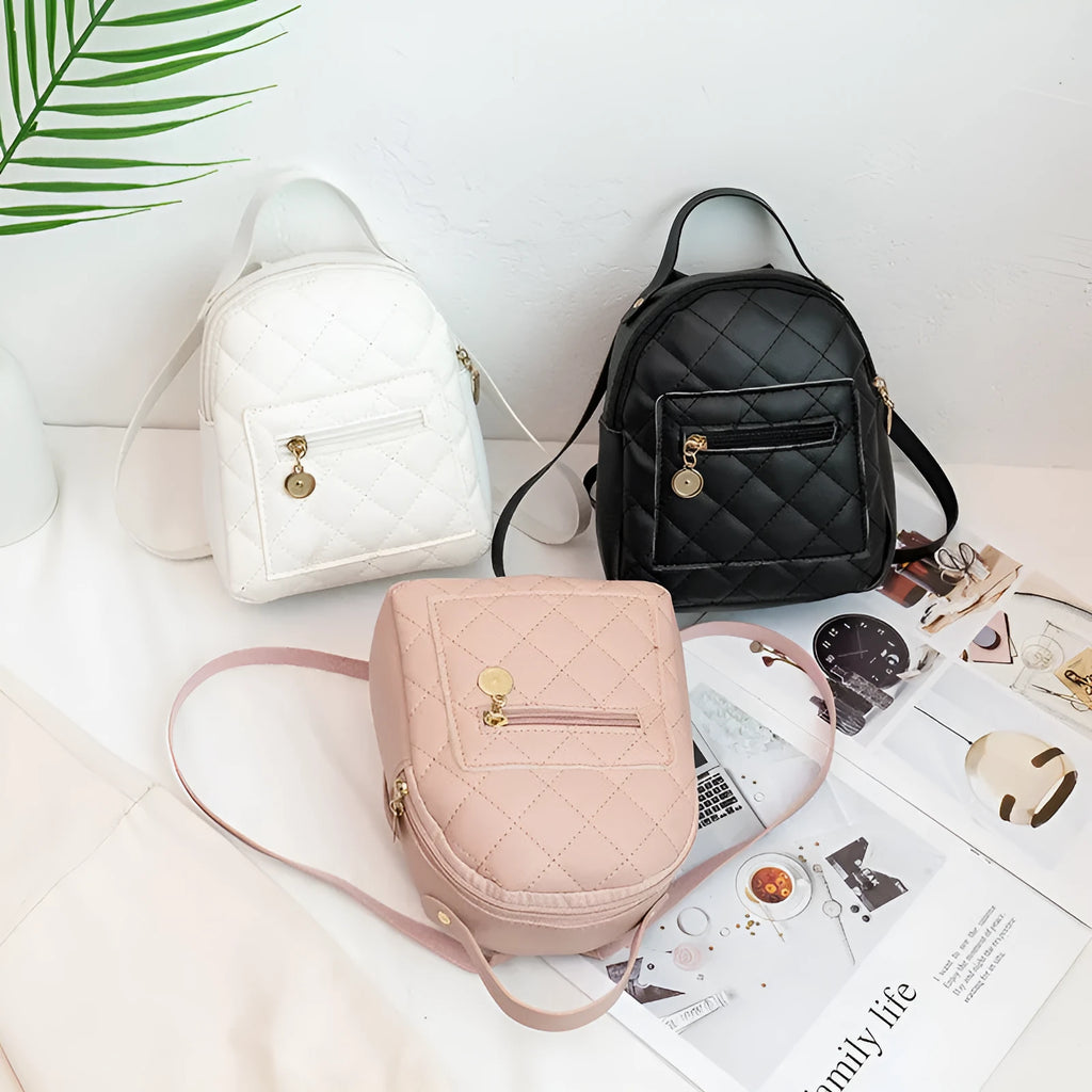 Hard square girls backpack with embroidered floral design in pink colour.