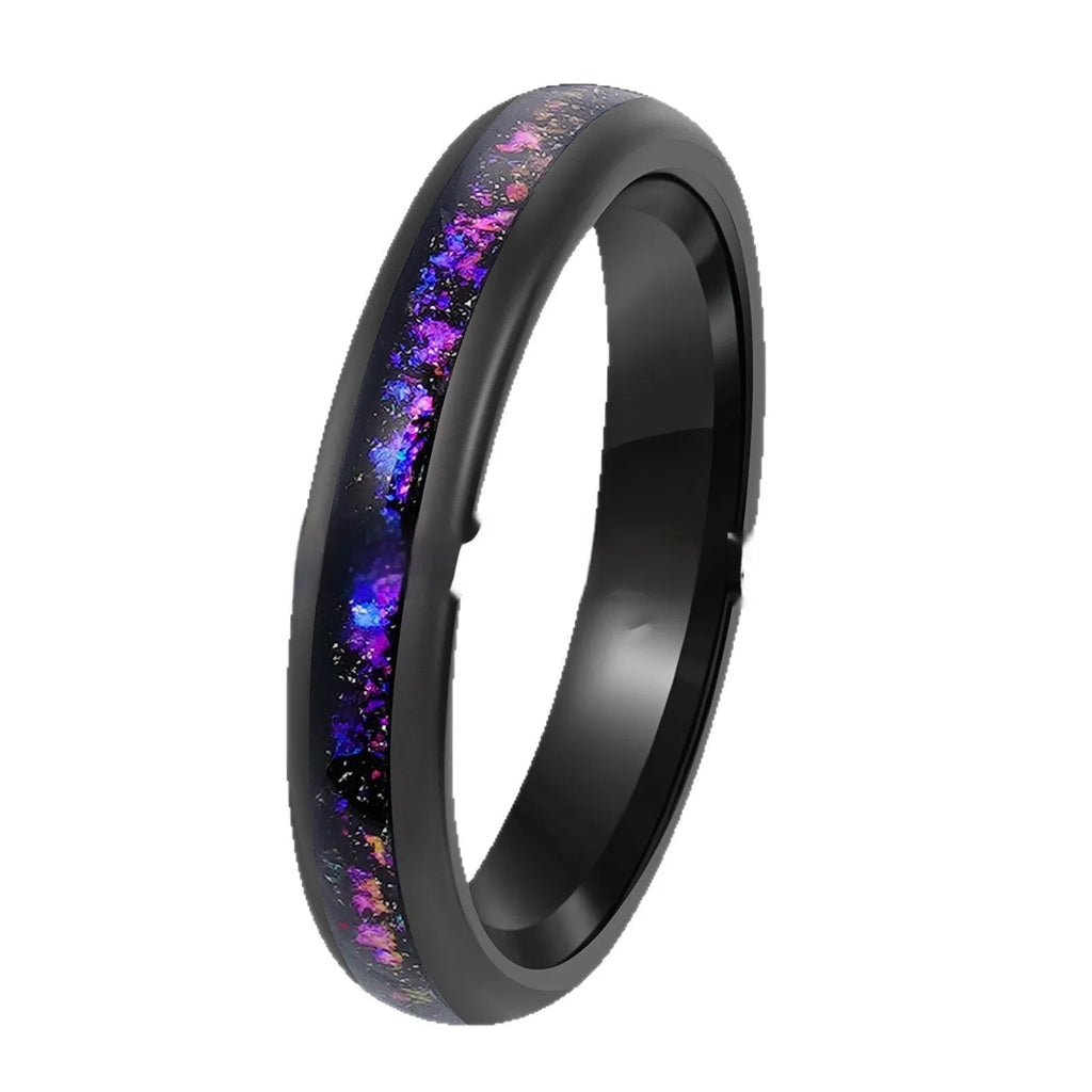 Galaxy tungsten ring with electroplated black finish and coloured inlay on a plain background