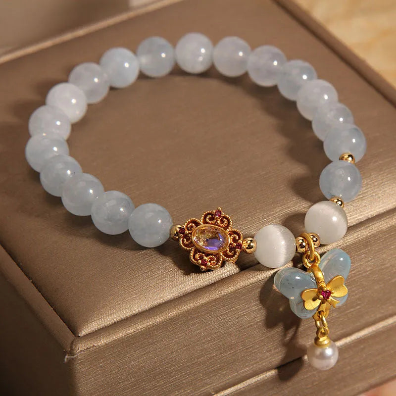 Women's aquamarine butterfly pendant bracelet with crystal rhinestones and decorative butterfly charm