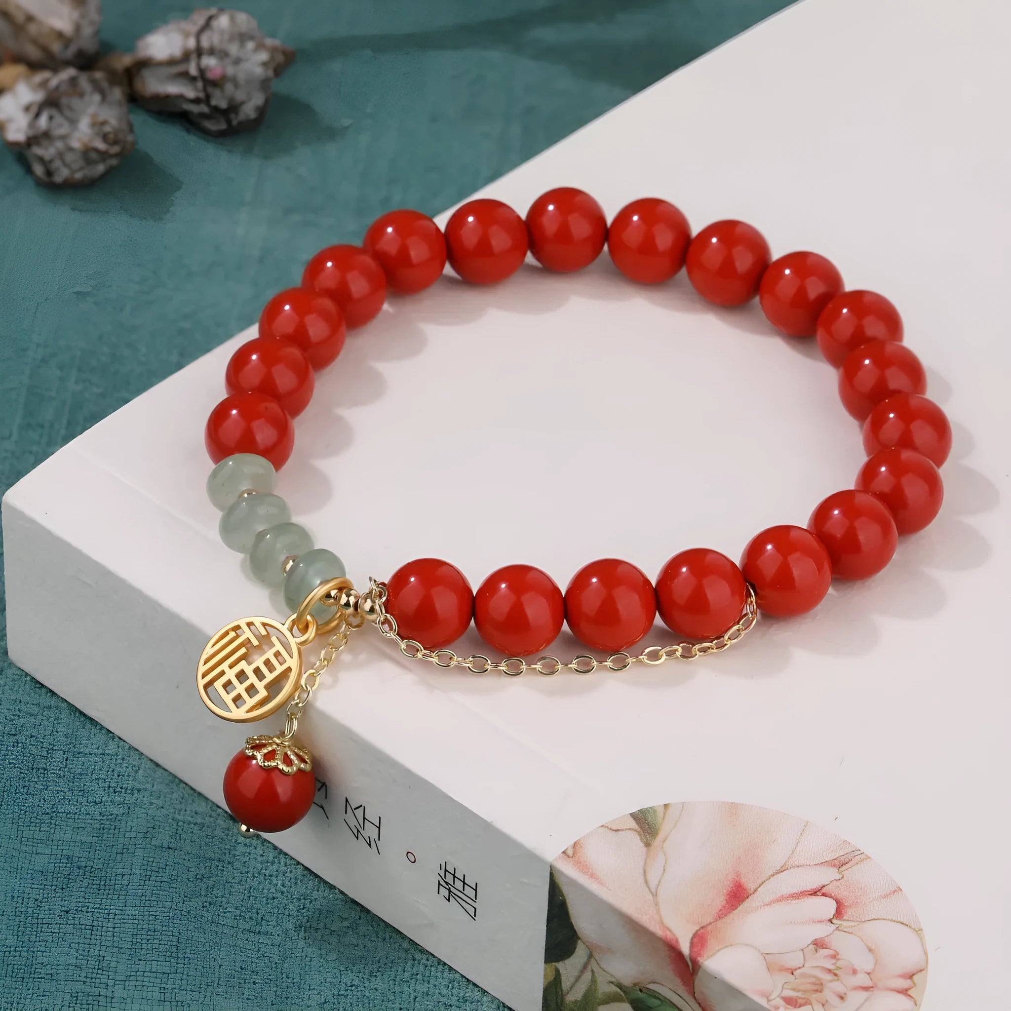 Women's red sand cinnabar bracelet with fu character charm and jade spacer