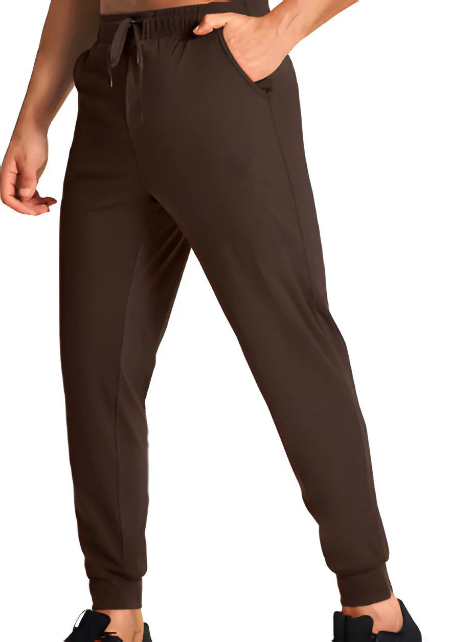 Men's solid-colour loose casual trousers in polyester fabric, shown in one of twelve available colour codes.
