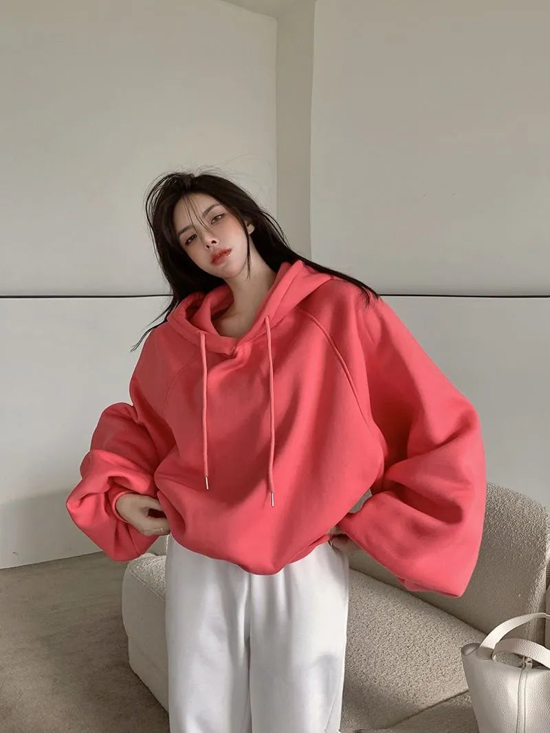 Watermelon red women's sleeveless hooded sweater made from Mulberry Silk, loose pullover style.