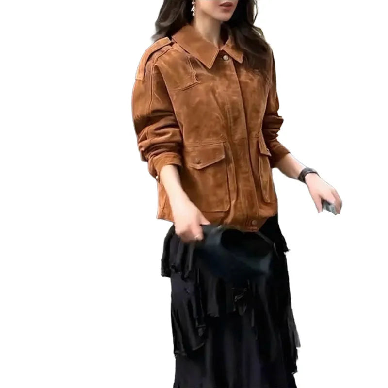 Bright brown women's suede-style polyester coat with regular sleeves on a hanger.