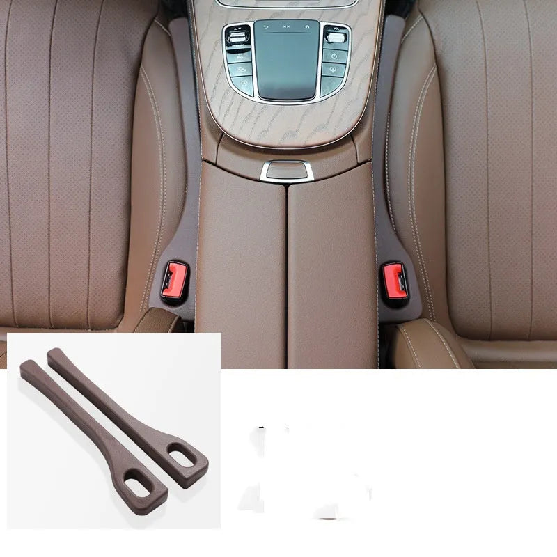 Car seat gap filler strip in polyresin with handle, shown in available colour options