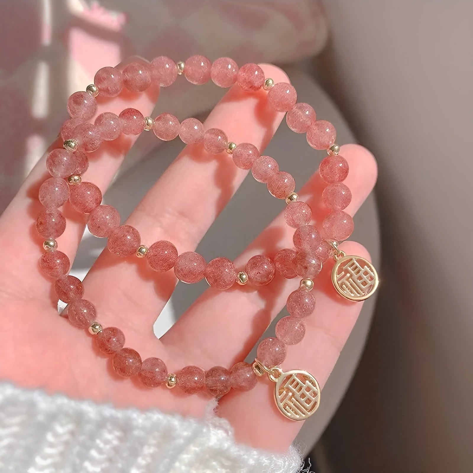 Handmade strawberry quartz blessing card bracelet with glass construction and adjustable universal wrist size