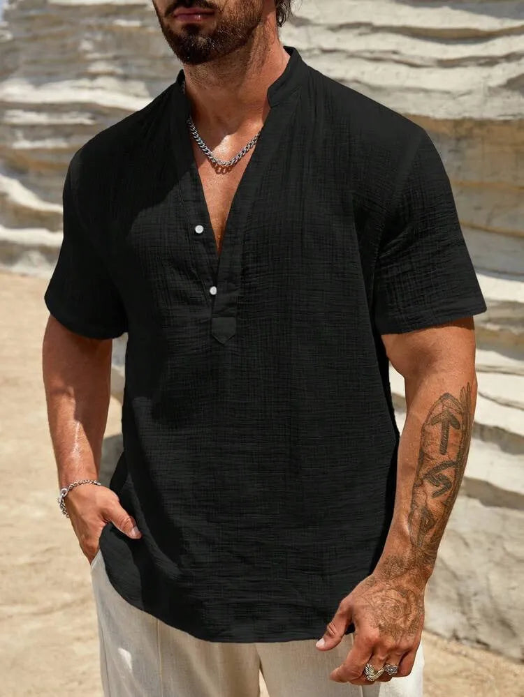 Men's solid colour short-sleeved shirt with a stand collar, shown in a casual style.