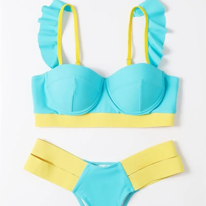 Women's rose red bikini with contrast push-up pads and underwire support on a mannequin.