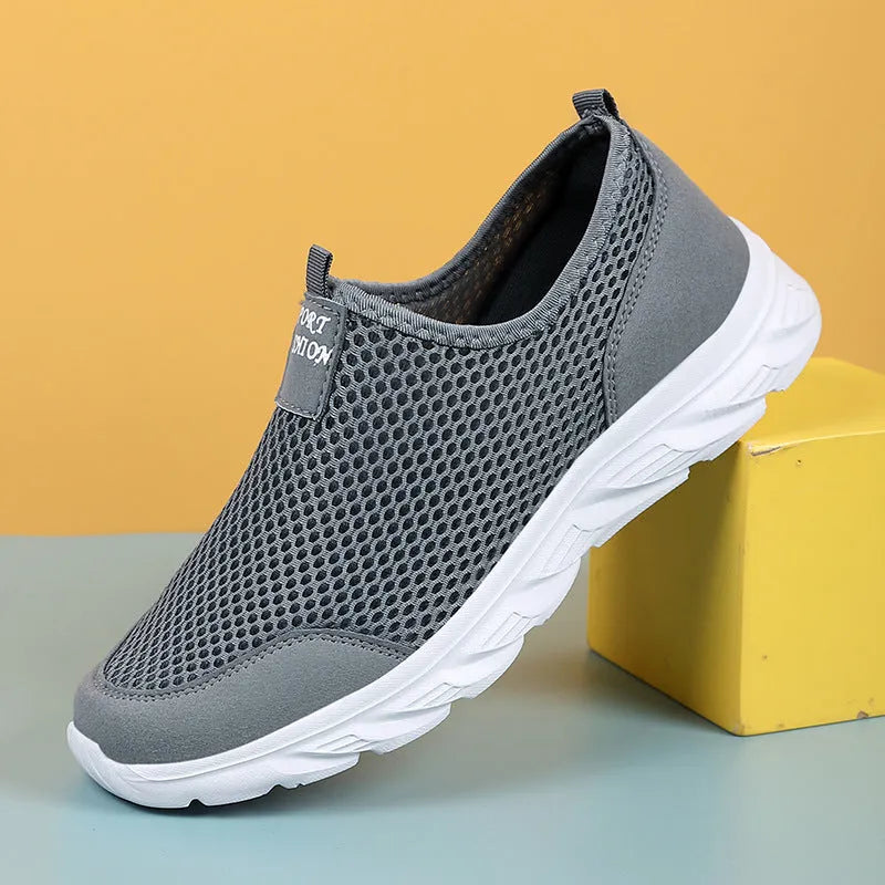 Large size mesh low-top casual sneakers with EVA sole, round toe, and sewing thread detail in grey, dark blue, black and white, or all black.