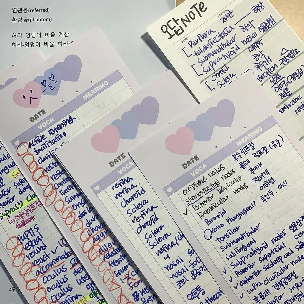 Vertical half-B5 notepad with English words, shown in pink, purple, and blue cover colour options.