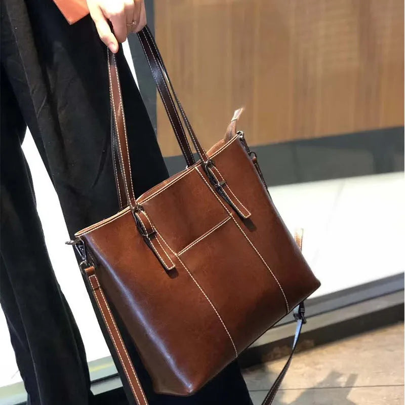 Brown genuine leather women's retro shoulder bag with three straps and horizontal square shape