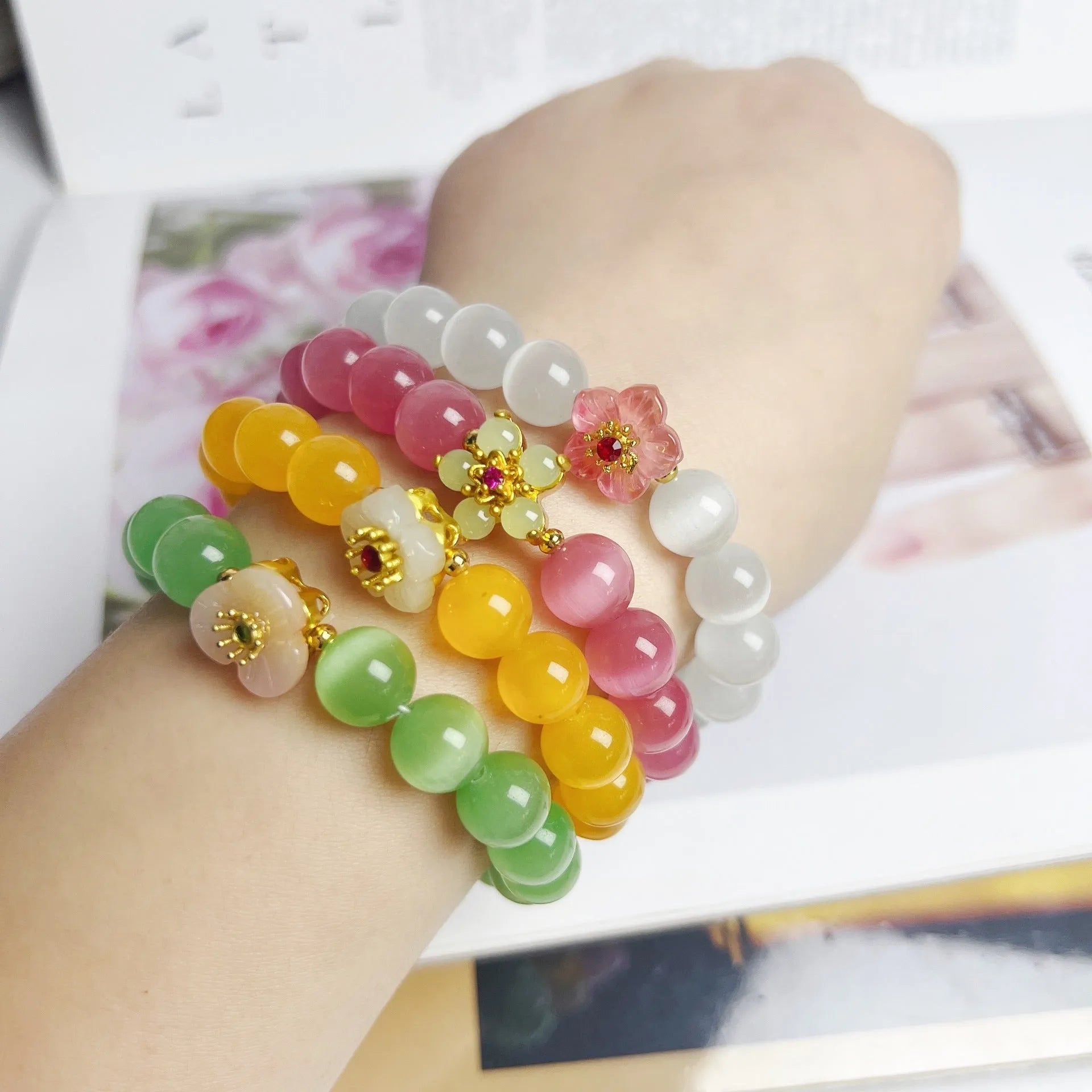 Handmade glass bracelet with flower beads in yellow, pink, white, green colours