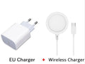 Silver metal Magsafe-compatible magnetic wireless charger for iPhone on a wooden desk.