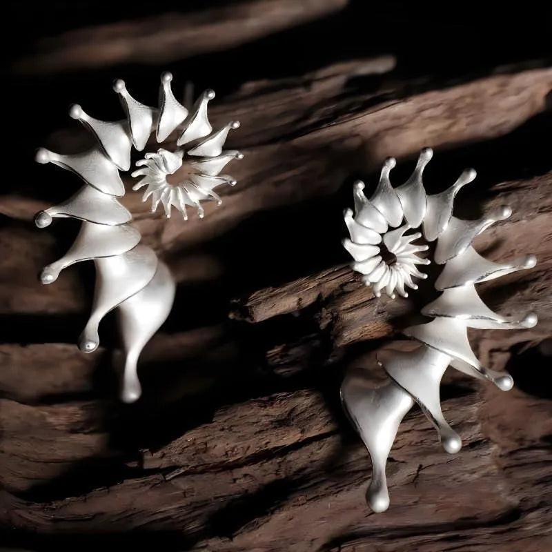 Conch-shaped three-dimensional matte earrings with exaggerated drop design and irregular shaping