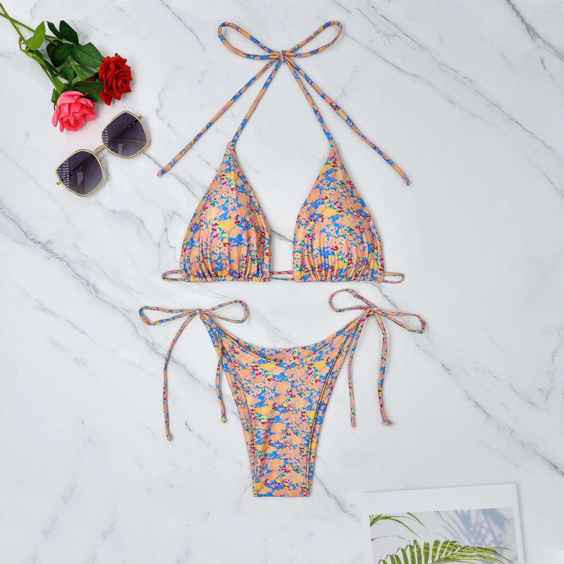 Women's lace-up bikini set in polyester for swimming, showing backless design.