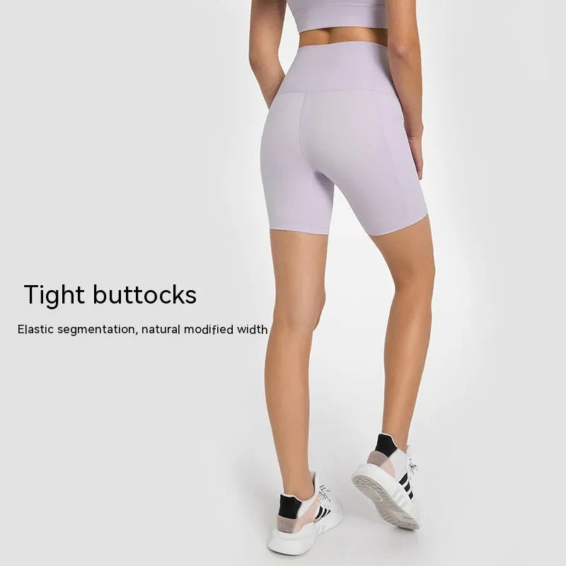 Women's solid colour sports shorts with super stretch fabric in fifth pants length