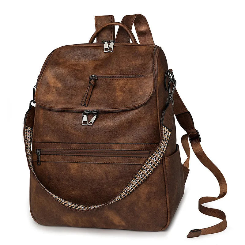 Retro college style PU backpack with curved shoulder straps, shown in one of six available colours.