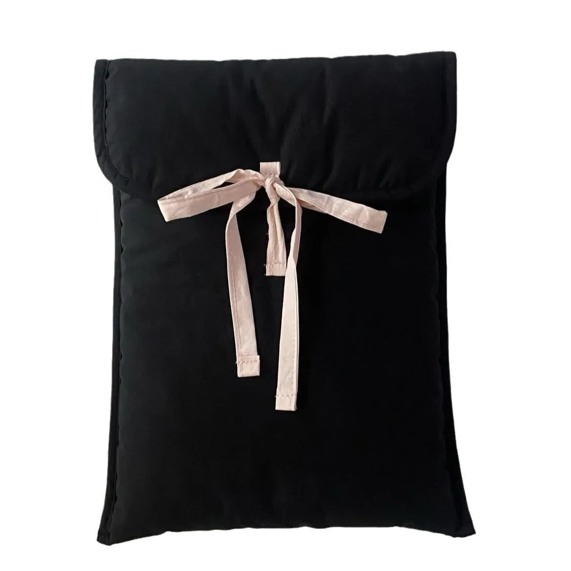 Black and white striped quilted laptop bag with a ballet-style bow.