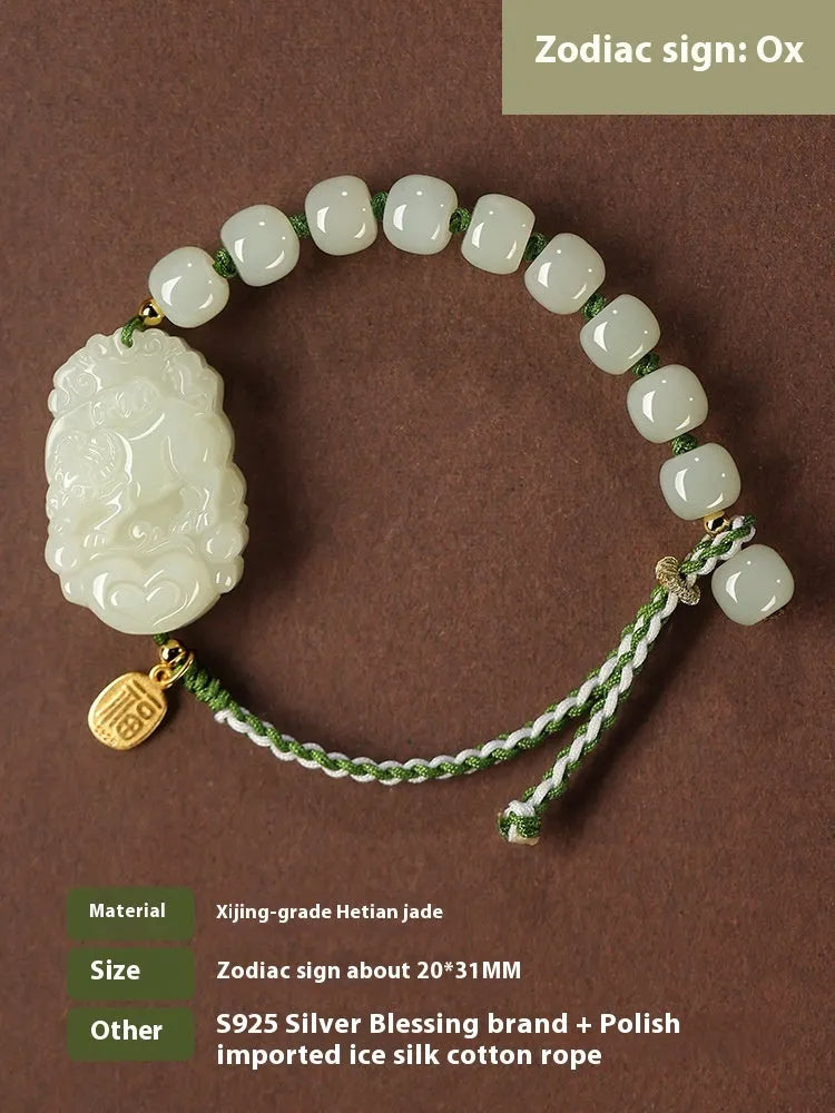Hetian jade and S925 silver Chinese zodiac bracelet on a red rope for the Year of the Rabbit