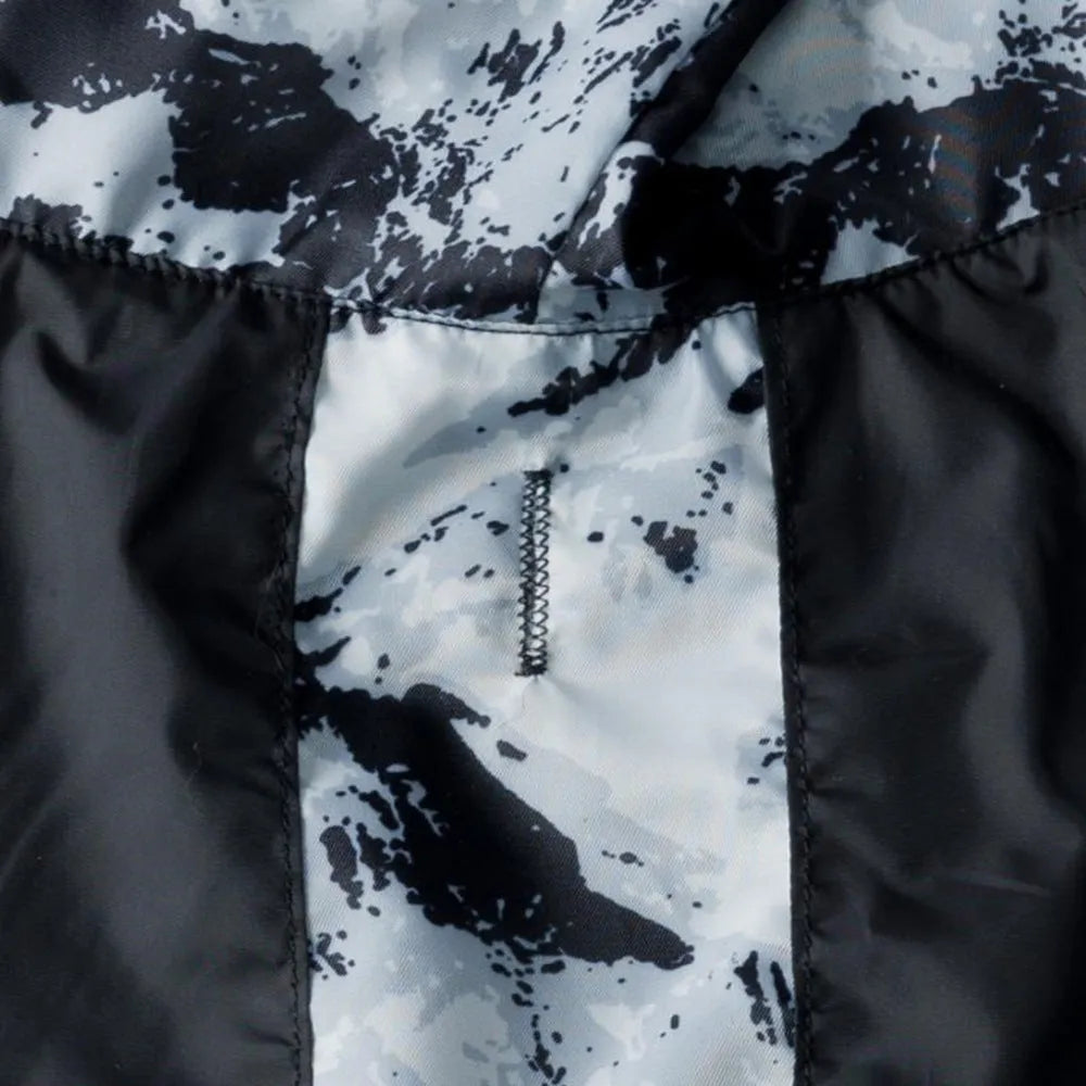 Dog wearing a windproof cotton coat with Five Generation Snow Mountain pattern, polyester material, available in sizes S to 5XL