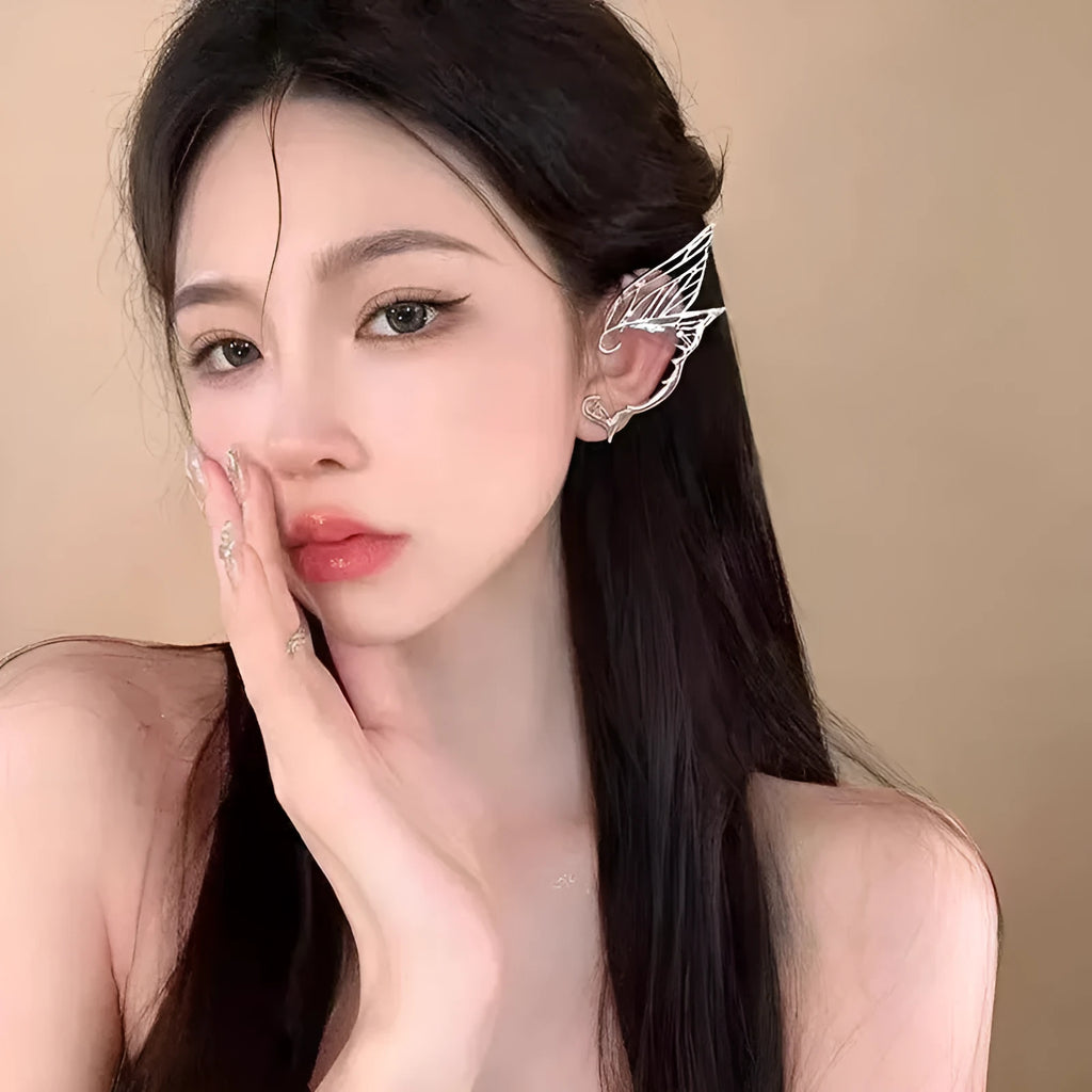 Butterfly wing ear clip made of alloy with electroplated finish, geometric textured design, available for left or right ear.