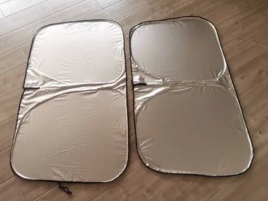 Titanium silver aluminium foil car sunshade folded, showing reflective surface and size options for windscreen protection.