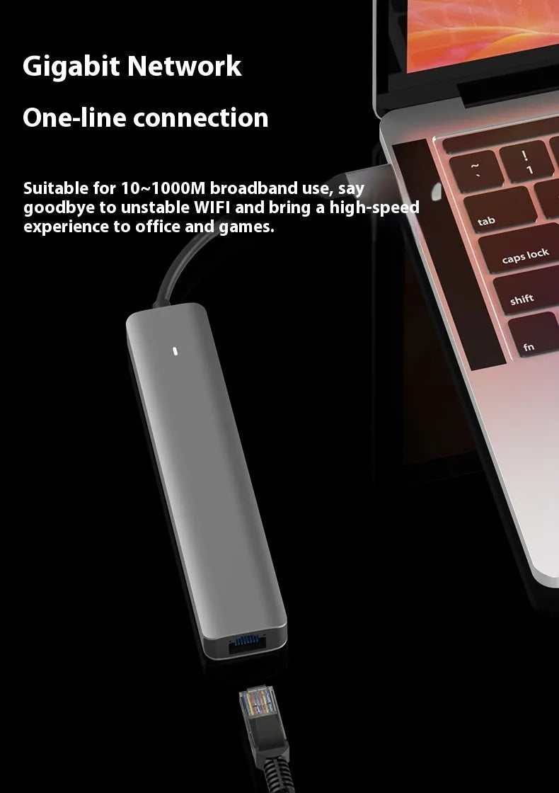 LQT-LH07 7-in-1 USB-C card reader and computer hub on a desk next to a laptop.