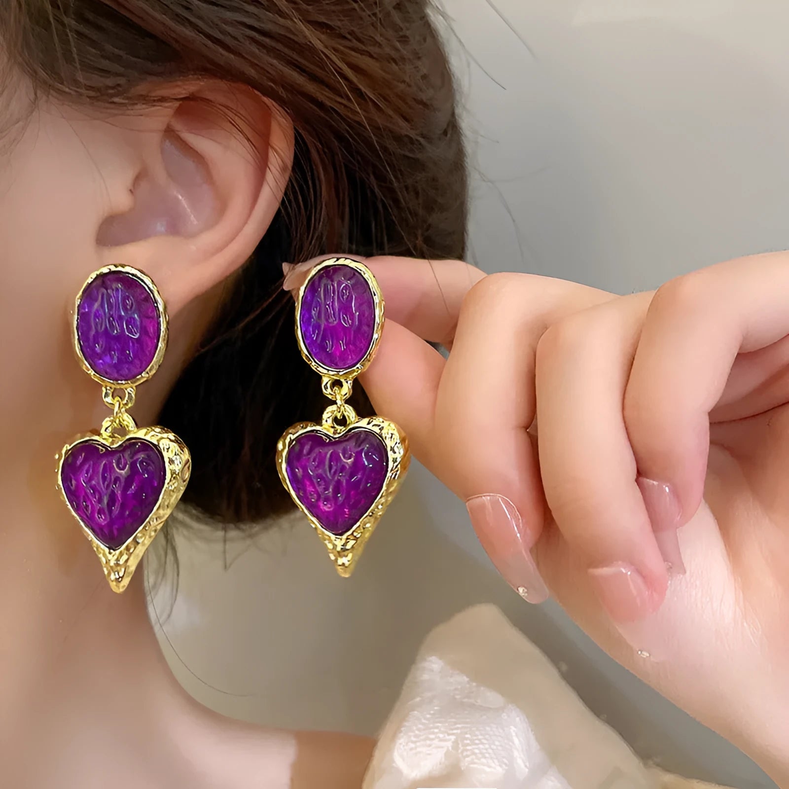 Oval love heart stud earrings with pleated texture in purple, red, green, and yellow-white colour options