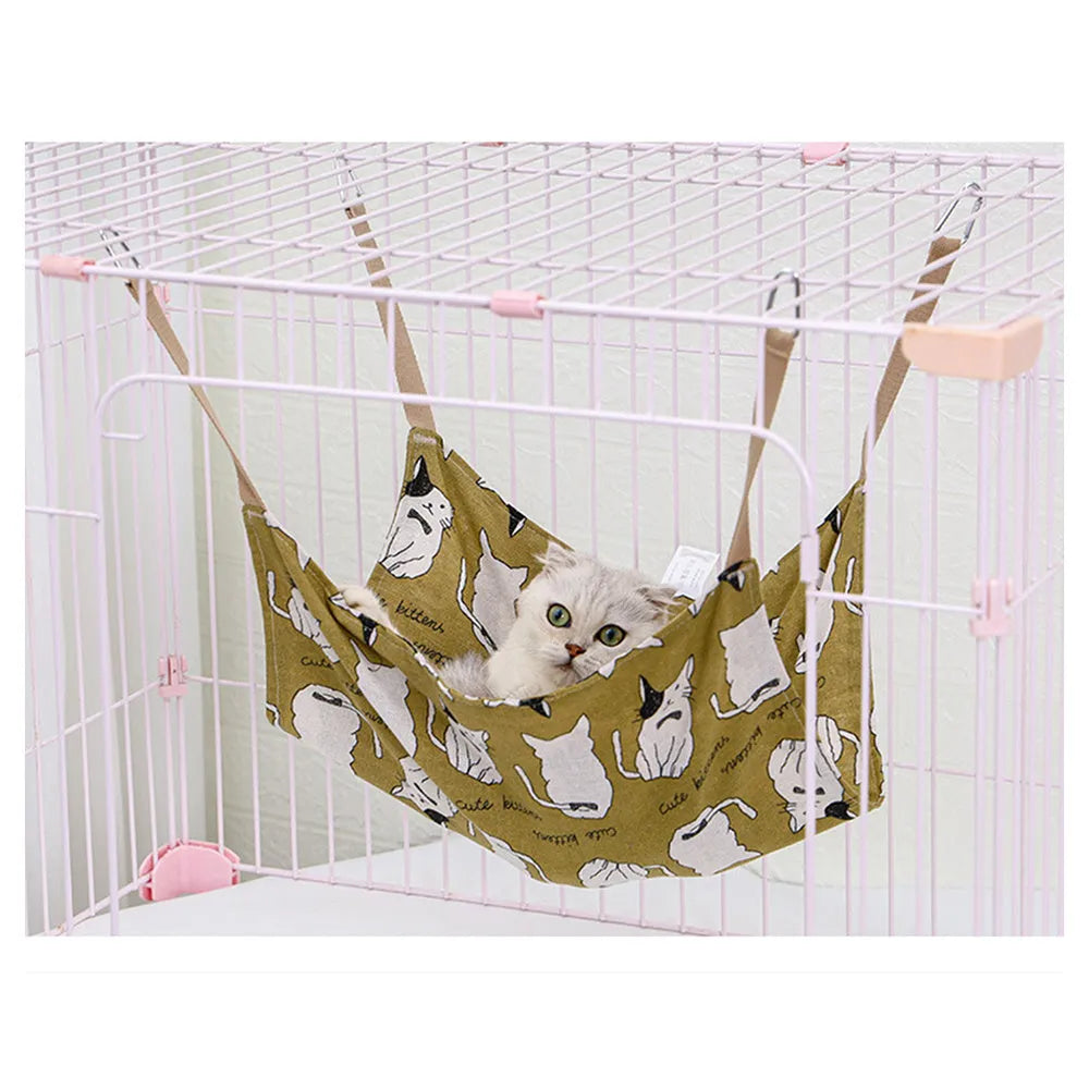 Yellow cotton linen cat hammock with metal hanging hook, shown suspended.